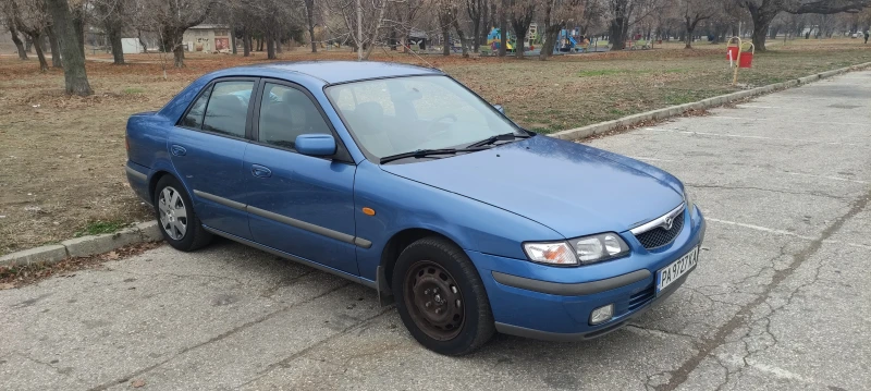 Mazda 323, снимка 1 - Автомобили и джипове - 48353048