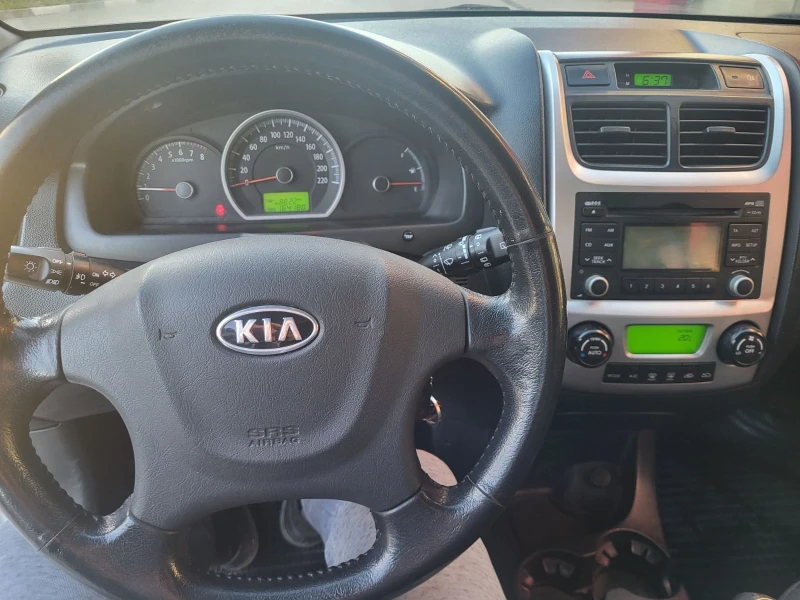 Kia Sportage 2.0 141, снимка 7 - Автомобили и джипове - 47439908