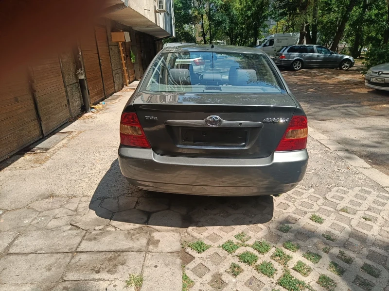 Toyota Corolla 1, 4 vvti , снимка 7 - Автомобили и джипове - 52457845