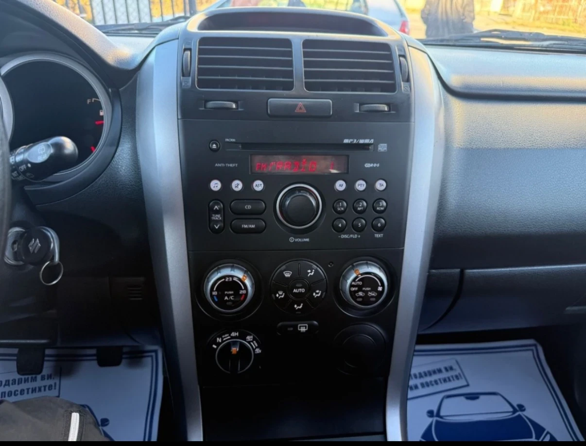 Suzuki Grand vitara 1.9 Дизел, 4х4, Климатик, снимка 13 - Автомобили и джипове - 54416993