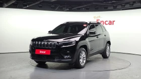 ������ Jeep Cherokee