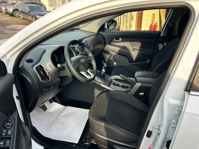 Kia Sportage 1.7CRDI 2WD, снимка 7 - Автомобили и джипове - 52635469