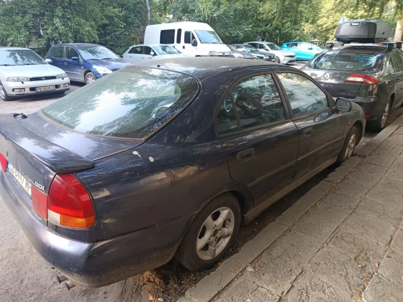 Mitsubishi Carisma GDI, снимка 3 - Автомобили и джипове - 51936302