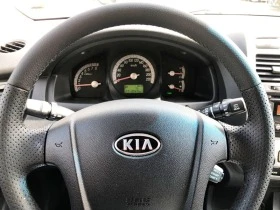 Kia Sportage 2.7i/4WD/ОБСЛУЖЕНА-ШВЕЙЦАРИЯ+ СЕРВ ИСТОРИЯ, снимка 11