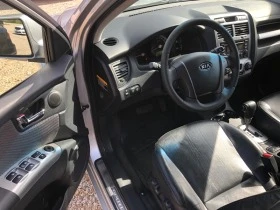 Kia Sportage 2.7i/4WD/ОБСЛУЖЕНА-ШВЕЙЦАРИЯ+ СЕРВ ИСТОРИЯ, снимка 9