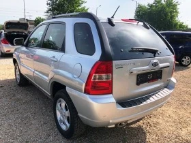 Kia Sportage 2.7i/4WD/ОБСЛУЖЕНА-ШВЕЙЦАРИЯ+ СЕРВ ИСТОРИЯ, снимка 7