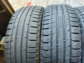 Гуми Летни 215/65R17, снимка 2 - Гуми и джанти - 38496289