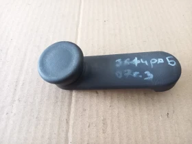 Дръжка регулиране стъкло задна лява Опел Зафира Б 