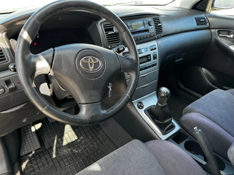 Toyota Corolla 1.4 Vvti, снимка 7 - Автомобили и джипове - 47496165