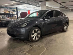 ������ Tesla Model Y