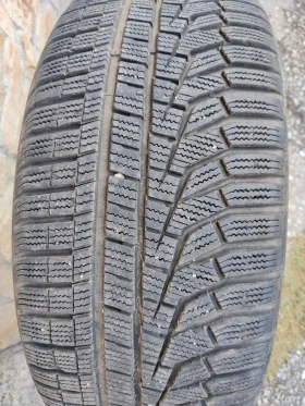 Гуми Зимни 235/50R18, снимка 1 - Гуми и джанти - 47497195