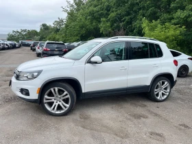 VW Tiguan *    * (CARFAX) | Mobile.bg    2