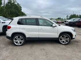 VW Tiguan *    * (CARFAX) | Mobile.bg    4