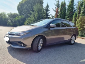 Обява за продажба на Toyota Auris 1.8, пълен хибрид, комби ~21 000 лв. - изображение 7