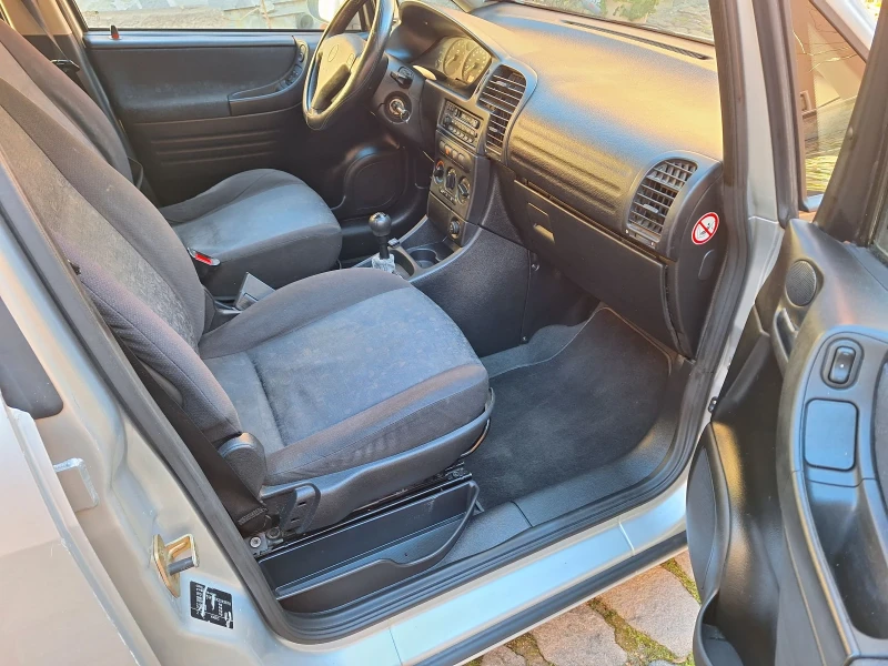 Opel Zafira 1.8 газ бензин 7 местен , снимка 16 - Автомобили и джипове - 53041845