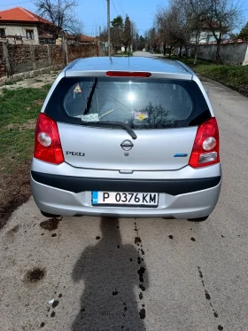 Nissan Pixo 2009 г., снимка 7