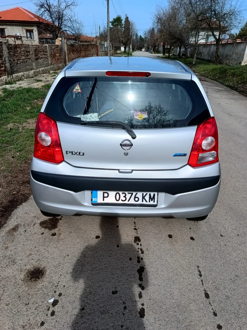 Nissan Pixo 2009 г., снимка 7 - Автомобили и джипове - 49493529