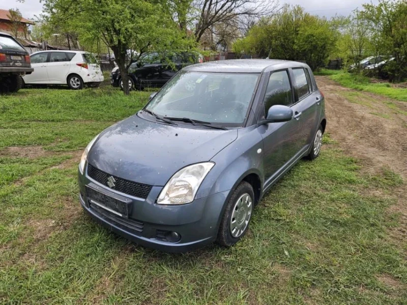 Suzuki Swift 1.3 , снимка 7 - Автомобили и джипове - 52018207