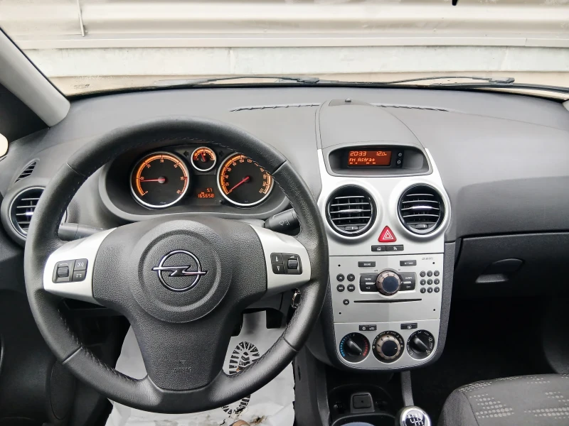 Opel Corsa 1.3cdti euro5b, снимка 11 - Автомобили и джипове - 52160232