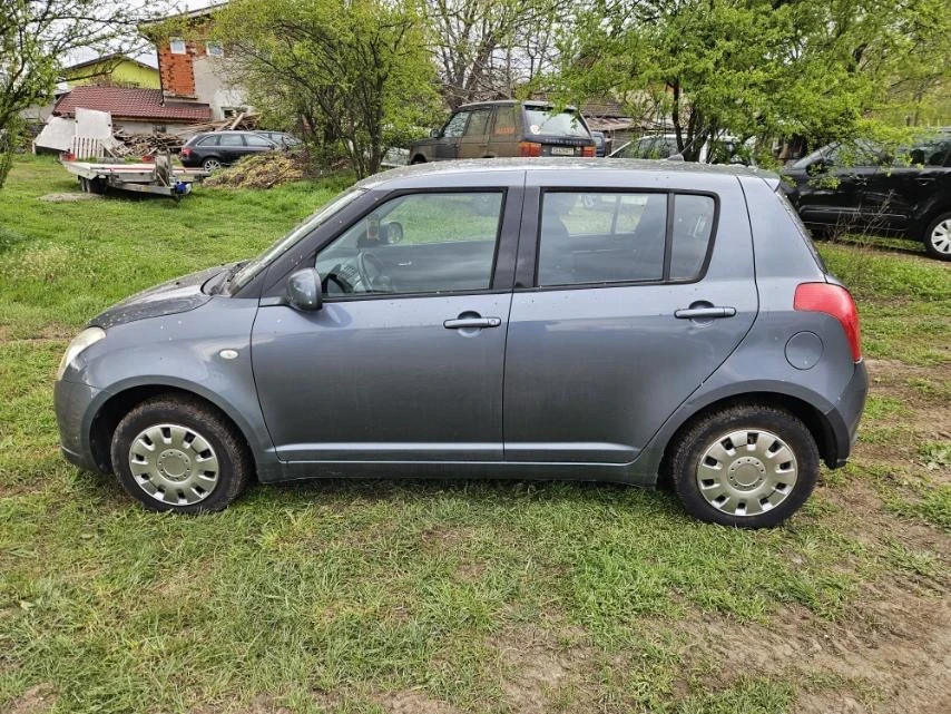 Suzuki Swift 1.3  - изображение 6