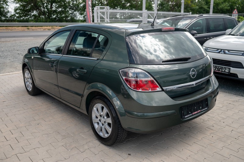 Opel Astra 1.6i* 2009г, снимка 6 - Автомобили и джипове - 46089573