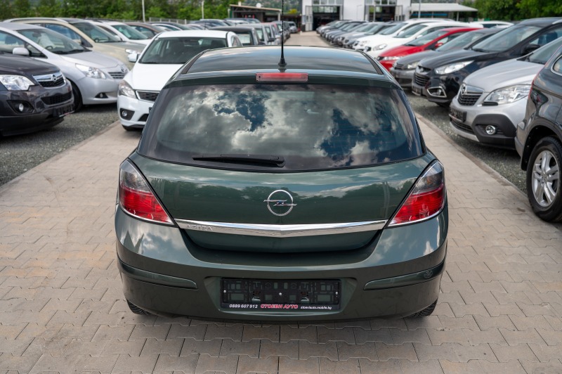 Opel Astra 1.6i* 2009г, снимка 8 - Автомобили и джипове - 46089573