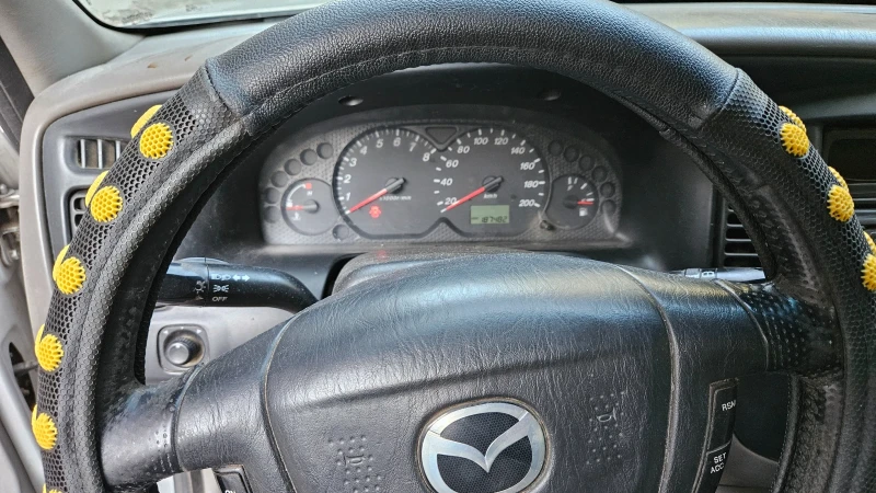 Mazda Tribute 2.0i, снимка 12 - Автомобили и джипове - 46975735