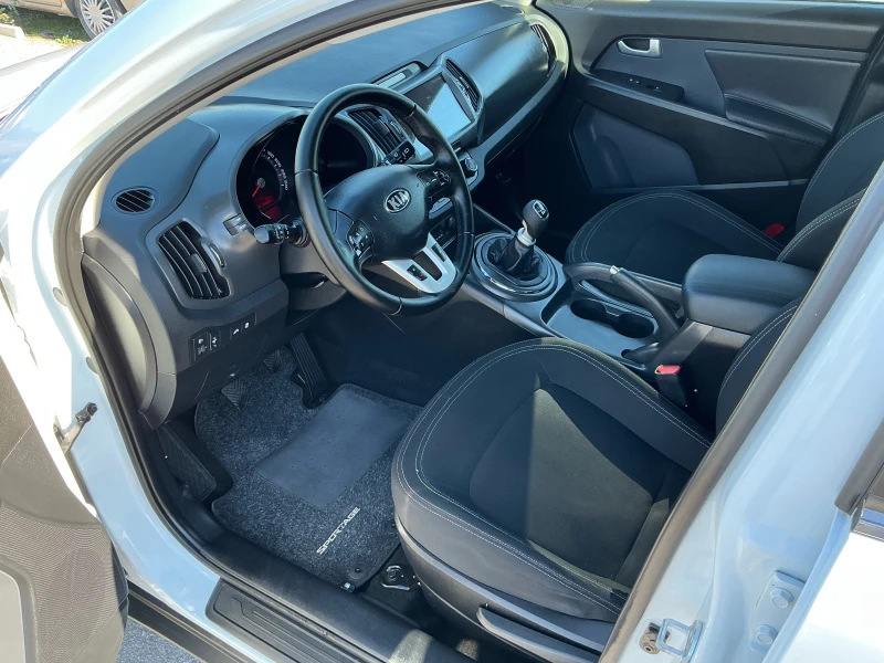 Kia Sportage 1.7 CRDI, снимка 13 - Автомобили и джипове - 51811972