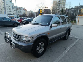 Kia Sportage Grand Wagon 2.0i 16v 4WD, снимка 2