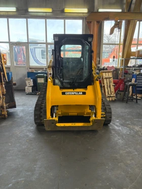 Мини челни товарачи Cat CAT 259B3, снимка 1