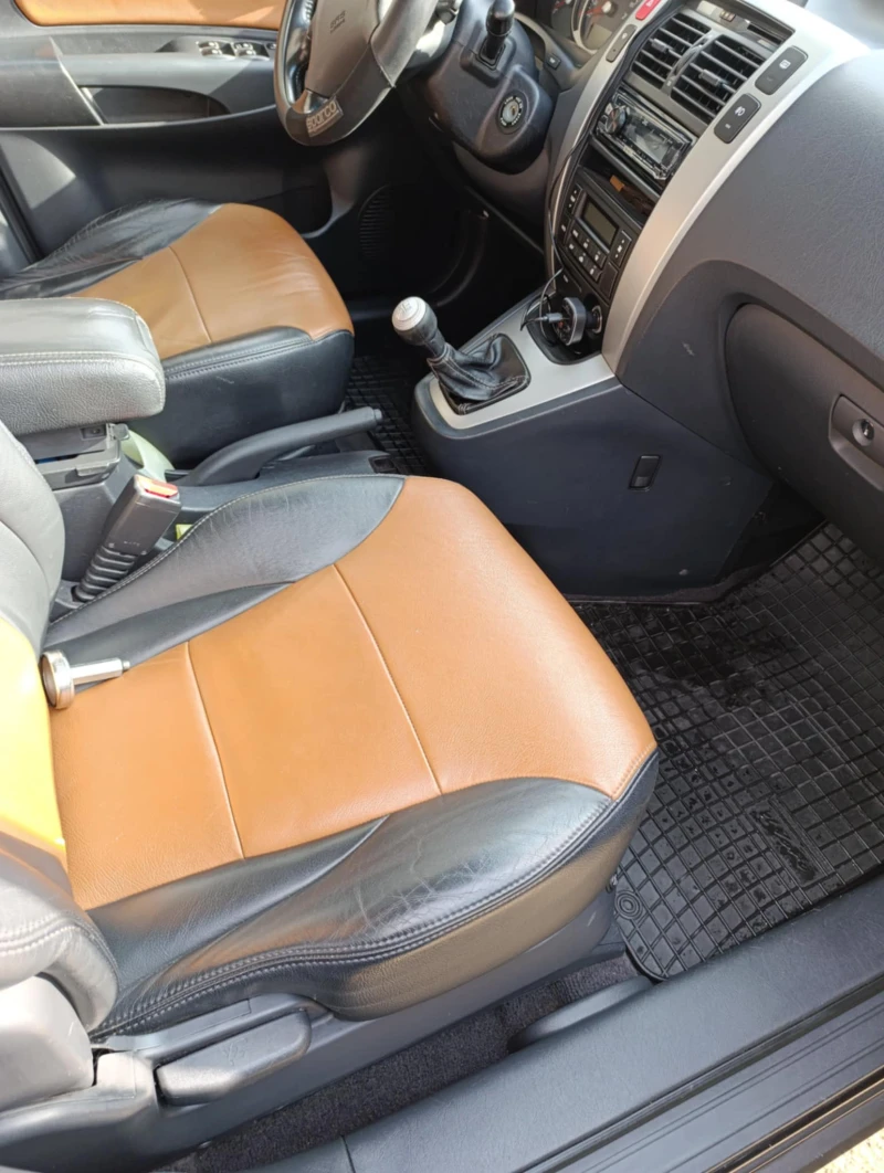 Hyundai Tucson, снимка 8 - Автомобили и джипове - 53202585