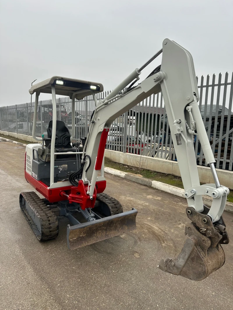 Багер Takeuchi TB 016