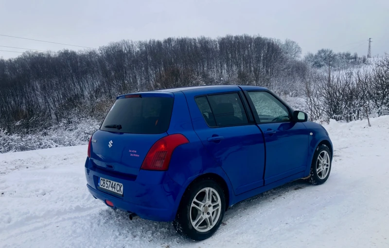 Suzuki Swift 1.3 DDiS, снимка 6 - Автомобили и джипове - 48620516