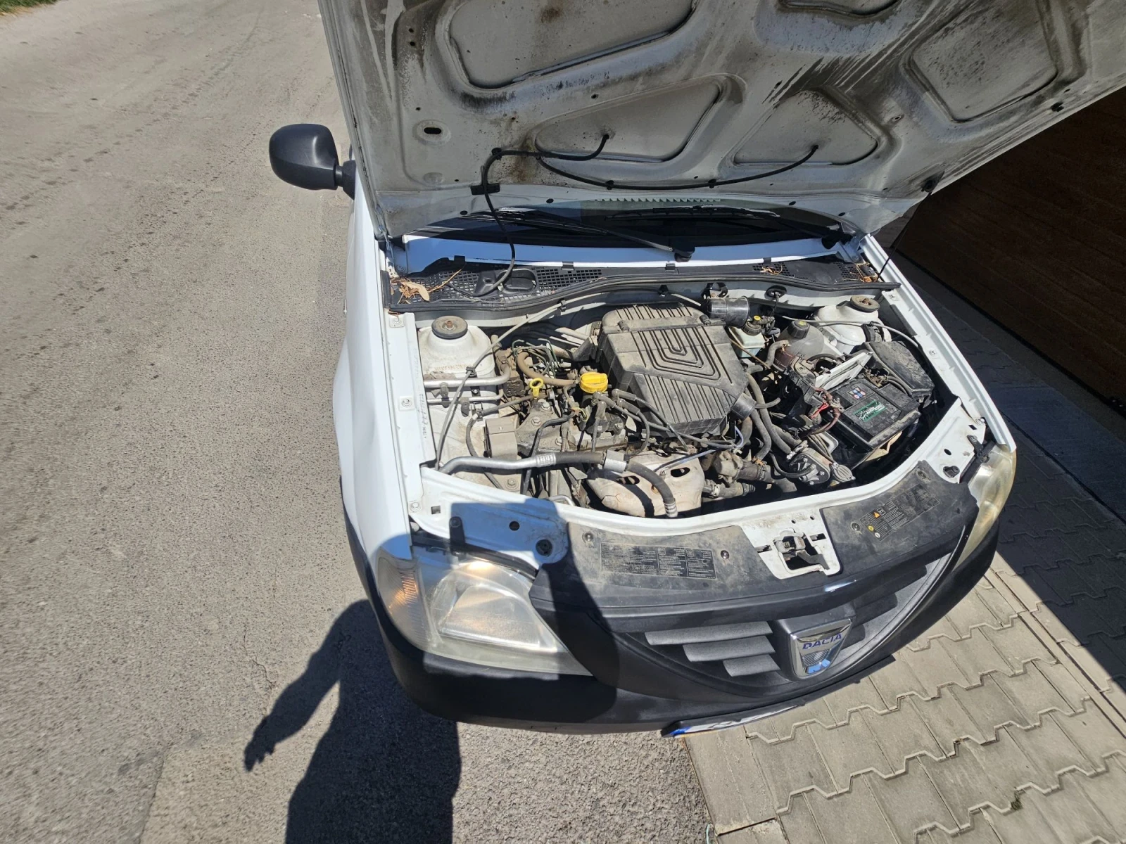 Dacia Logan 1.6 газ климатик , снимка 9 - Автомобили и джипове - 55631731