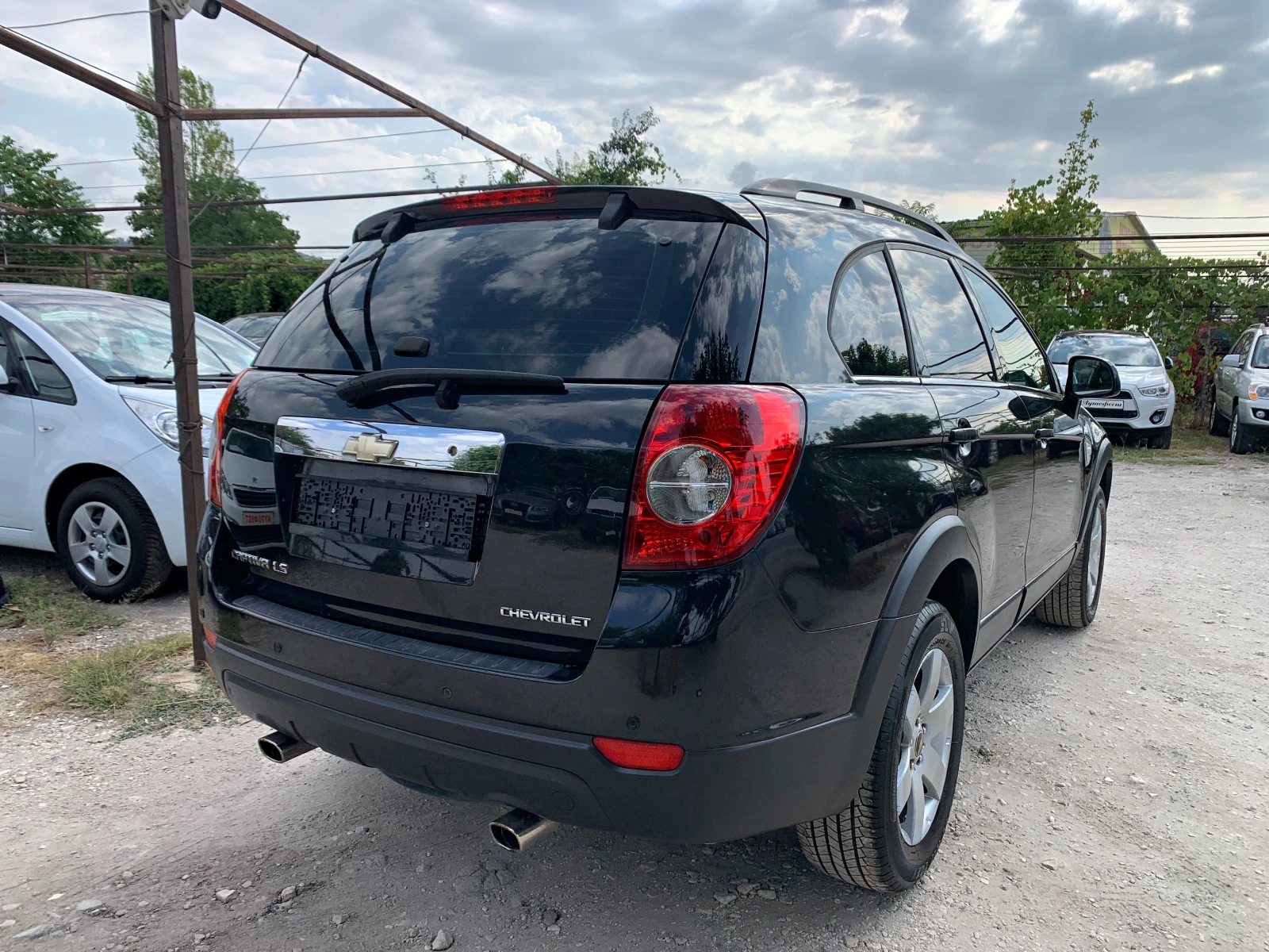 Chevrolet Captiva 2.4i ГАЗОВ ИНЖЕКЦИОН 6+ 1М, снимка 4 - Автомобили и джипове - 55694756