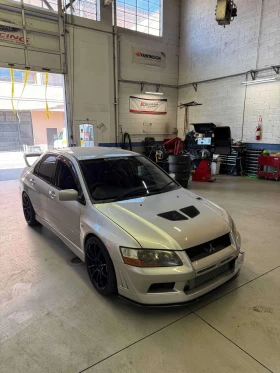 Mitsubishi Lancer EVOLUTION VII| РЪЧНИ СКОРОСТИ| ДЕСЕН ВОЛАН| , снимка 1