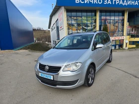 VW Touran 1.6i-102к.с.-7 местен - 8500 лв. - 57477133 | Car24.bg