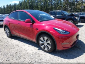 ������ Tesla Model Y