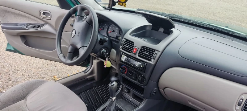 Nissan Almera 1.5 90 hp LPG, снимка 9 - Автомобили и джипове - 53233323