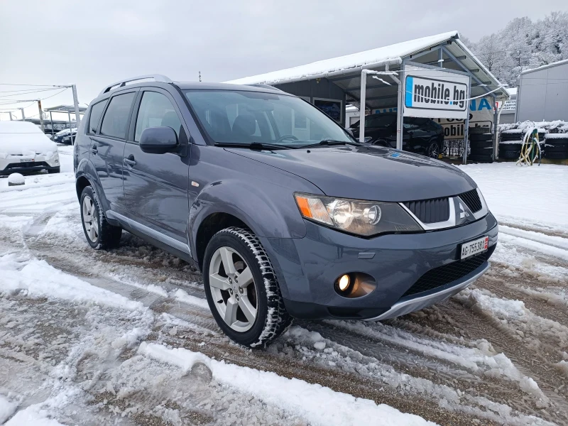 Mitsubishi Outlander 2.4i-170кс-ШВЕЙЦАРИЯ-РЪЧКА-4Х4, снимка 2 - Автомобили и джипове - 53065531