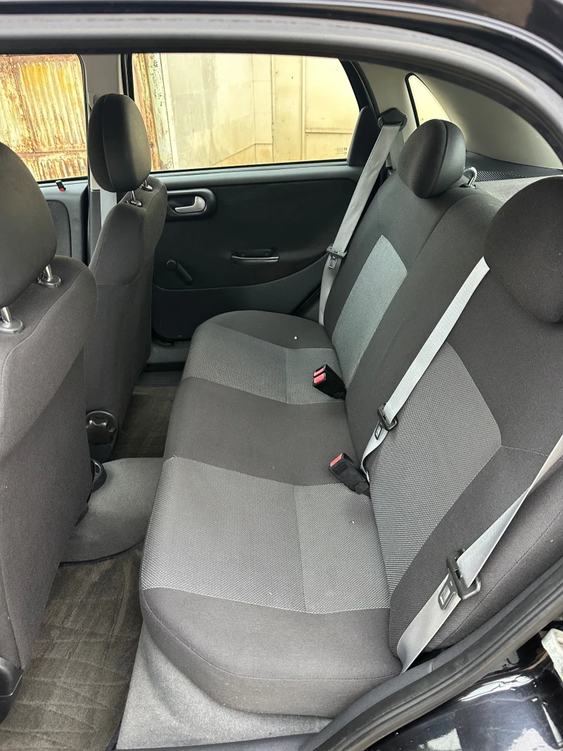 Opel Corsa 1.4 90кс, снимка 11 - Автомобили и джипове - 52672752
