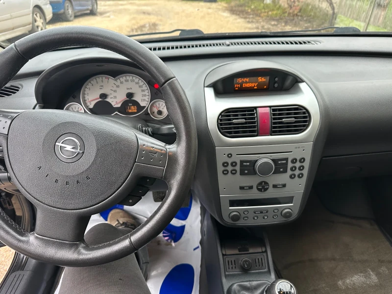 Opel Corsa 1.4 90кс, снимка 9 - Автомобили и джипове - 52672752