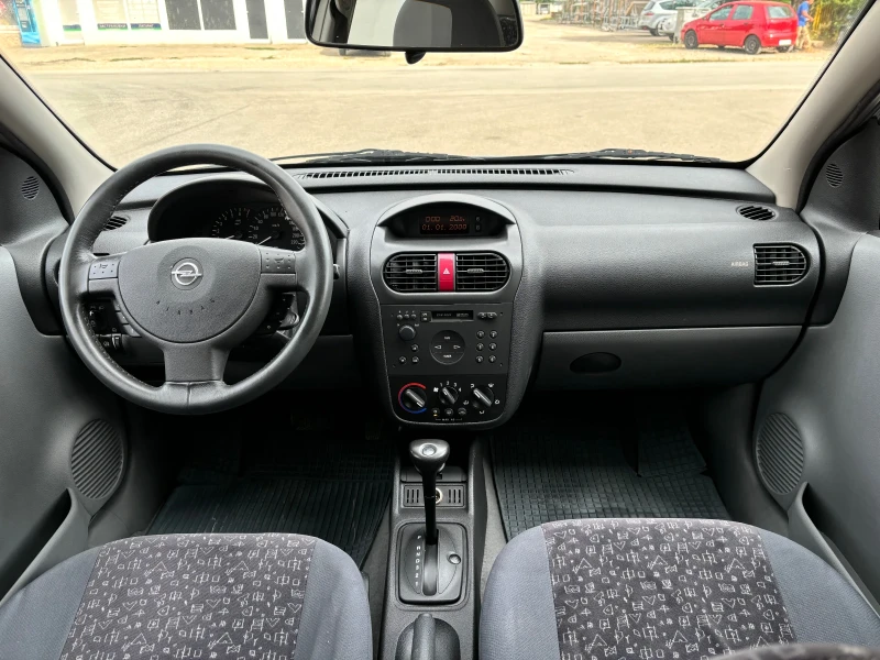 Opel Corsa 1.4i Автоматик* Климатик* 124000км, снимка 10 - Автомобили и джипове - 47056400