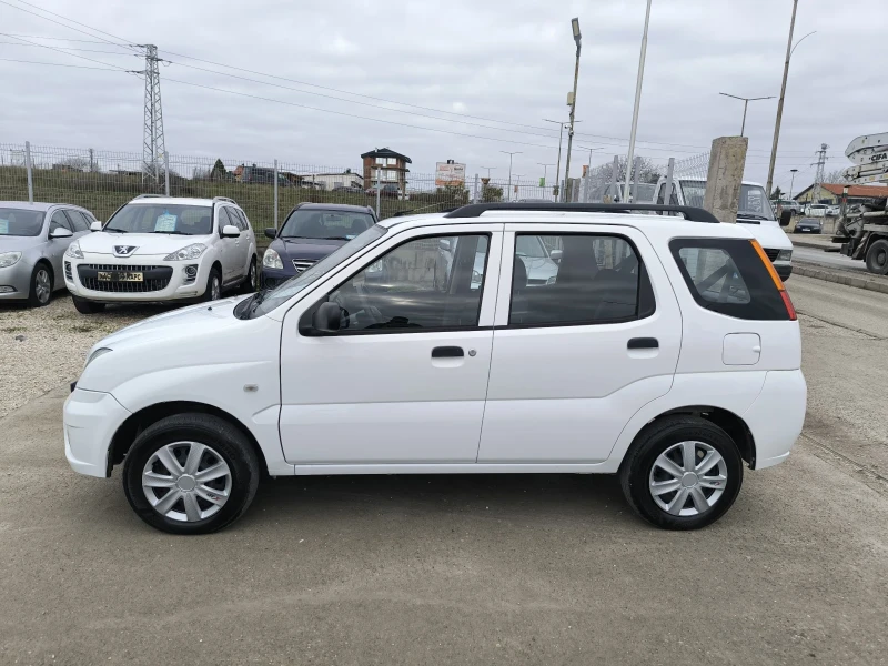 Subaru Justy 1.3i, снимка 6 - Автомобили и джипове - 52713901