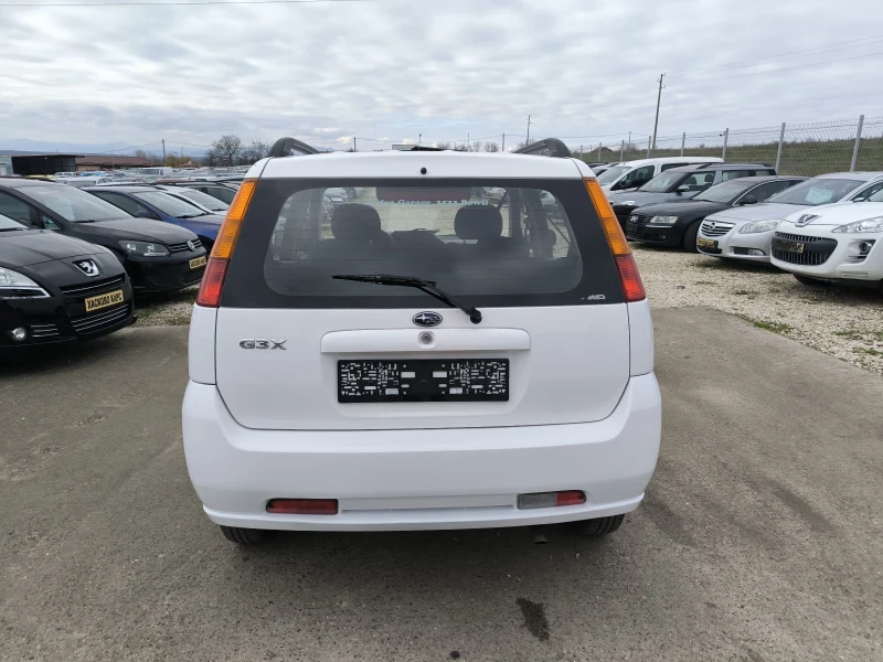 Subaru Justy 1.3i, снимка 5 - Автомобили и джипове - 52713901