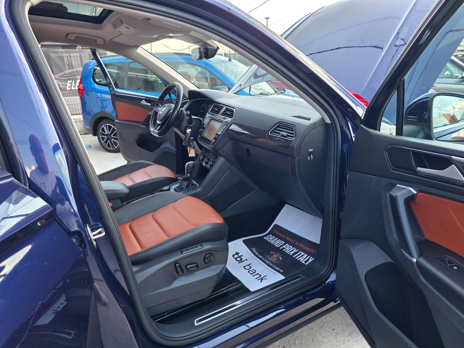VW Tiguan 2.0TSI-180к.с 4Х4-НАВИГАЦИЯ-ПАНОРАМА-ШВЕЙЦАРИЯ, снимка 14 - Автомобили и джипове - 55658330