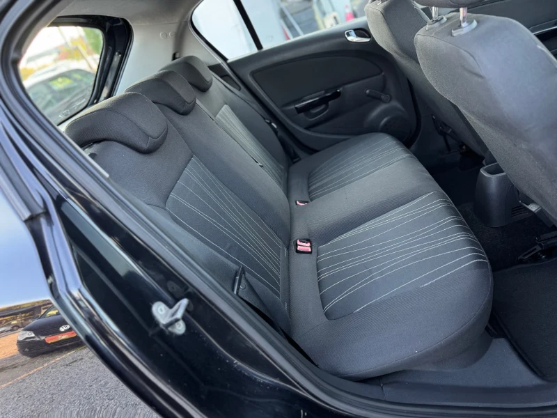 Opel Corsa 1.4i 90кс КЛИМАТИК МУЛТИ-ВОЛАН , снимка 13 - Автомобили и джипове - 52091577