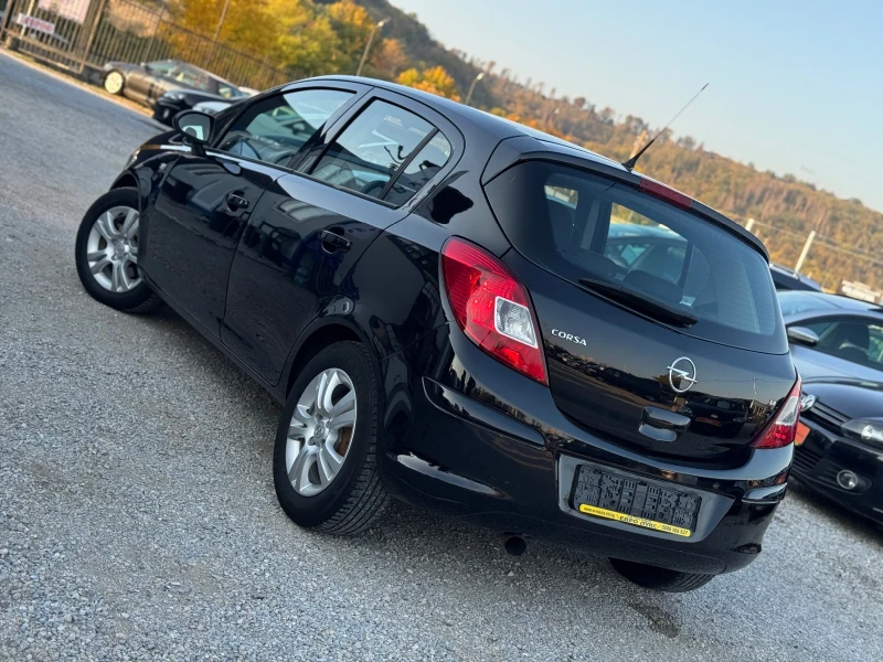 Opel Corsa 1.4i 90кс КЛИМАТИК МУЛТИ-ВОЛАН , снимка 4 - Автомобили и джипове - 52091577