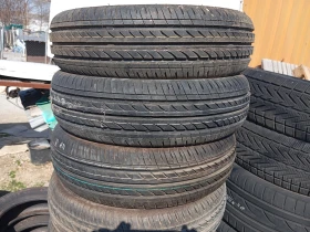 Гуми Всесезонни 185/60R14, снимка 4 - Гуми и джанти - 49512041