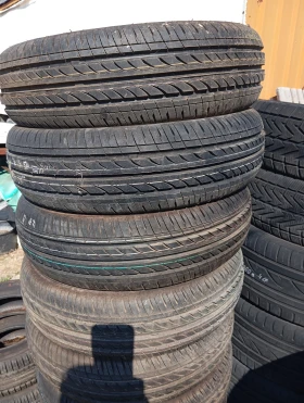 Гуми Всесезонни 185/60R14, снимка 1 - Гуми и джанти - 49512041